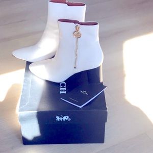Coach chalk iris boots worn twice size 8 in very good condition.